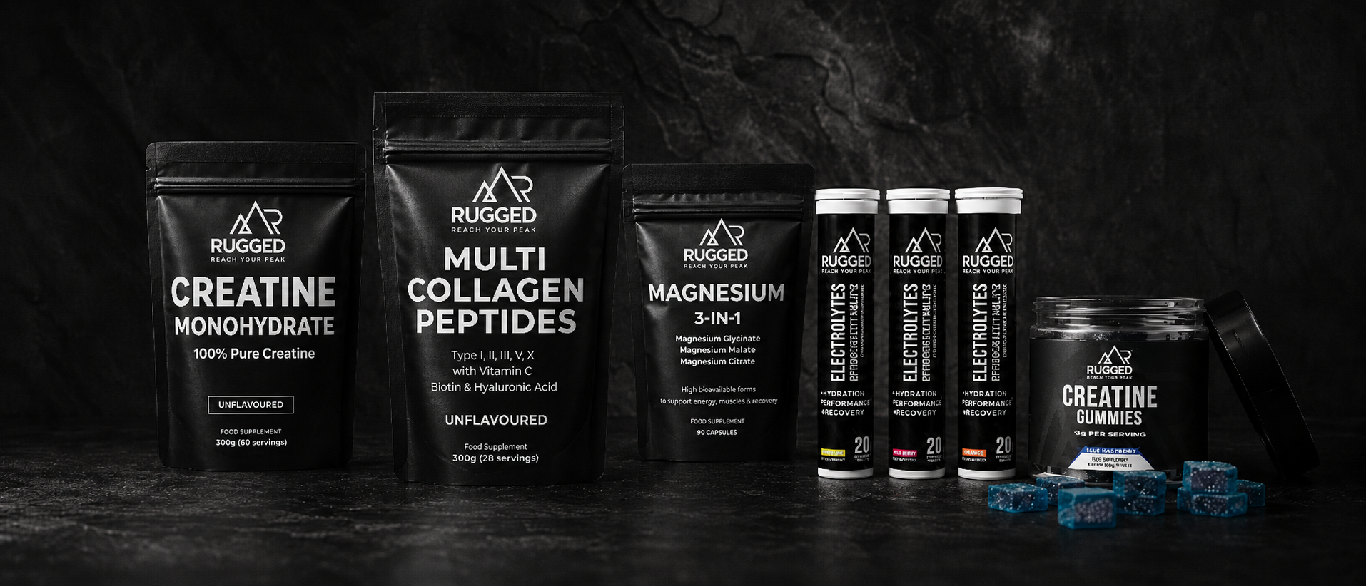 Collection of Rugged Supplements products on a dark background
